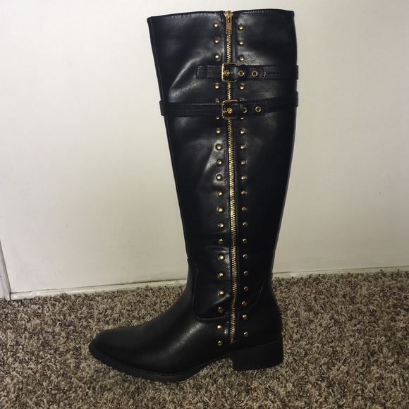 Black and gold boots