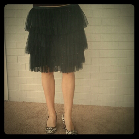 Multi layered mesh & sequin black skirt.