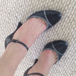 Cole Haan black leather pumps with silver accents