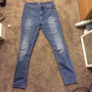 High waisted slightly distressed skinny jeans