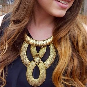 Show stopping textured golden bib necklace