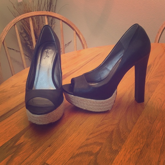 Black leather heels size 7.5 worn once