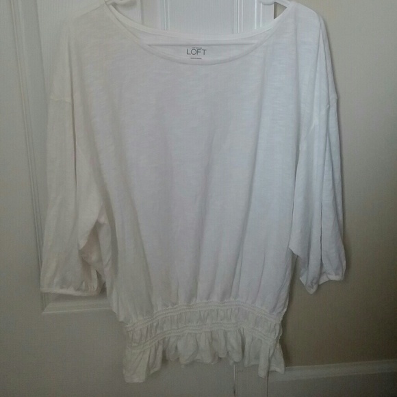 White t-shirt with gathered bottom.