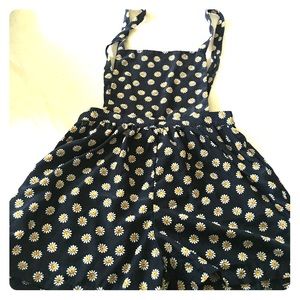 Navy blue sunflower shorts overalls.