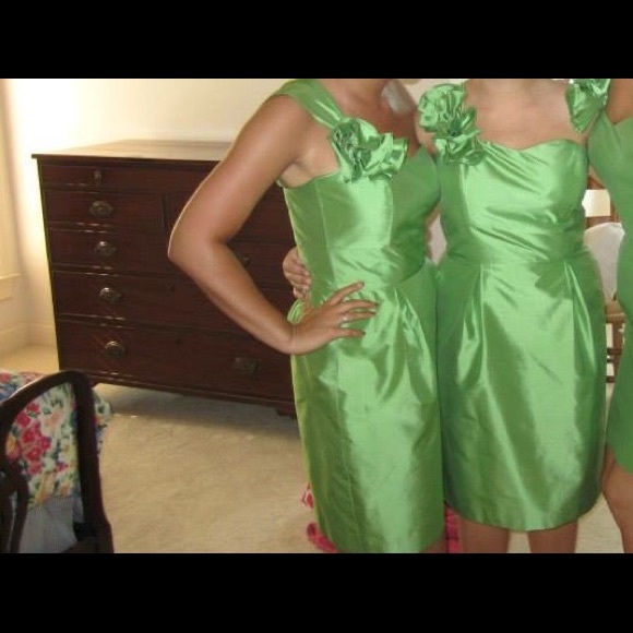 Light green one shoulder dress.