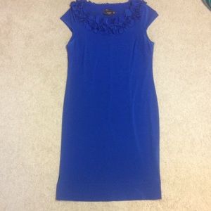 Pretty, dressy blue dress. Flower detailing.