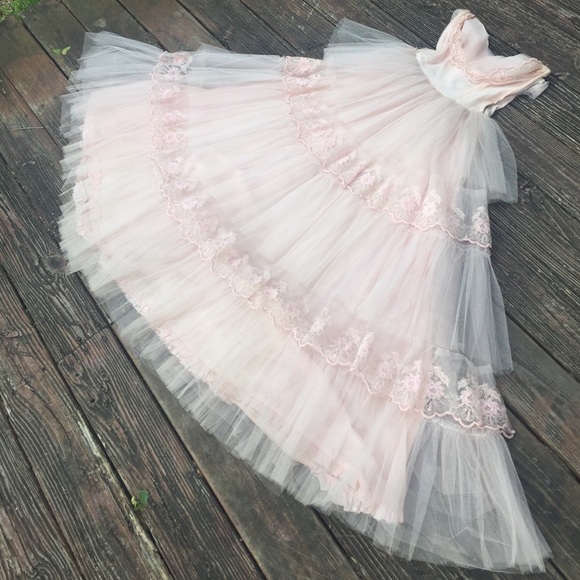 Light pink tulle tiered ball gown