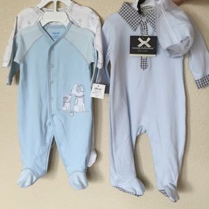 Newborn boy onesies with hat included.