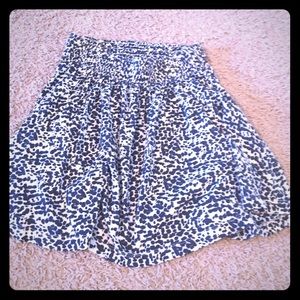 White skirt with blue pattern