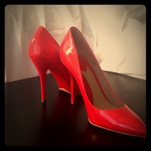 Brian Atwood red patent leather pumps