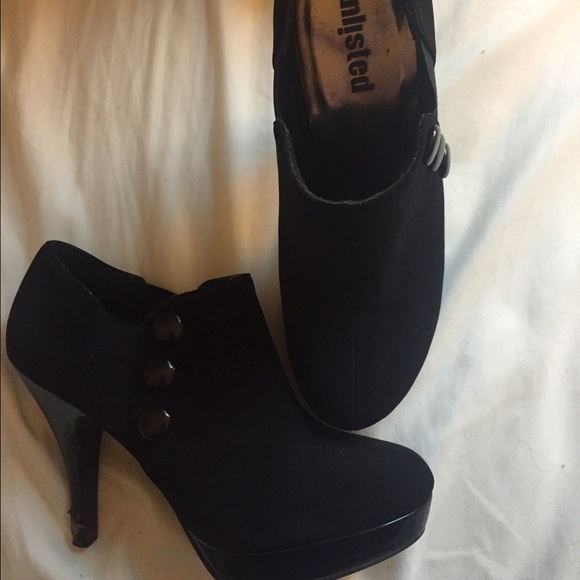 Black high heels with side buttons