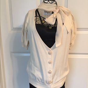 Dressy cardigan with chiffon bow around the neck.