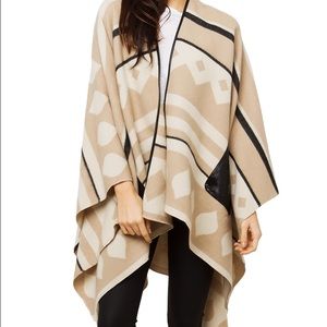Black/Cream/Tan pocket poncho from Akira