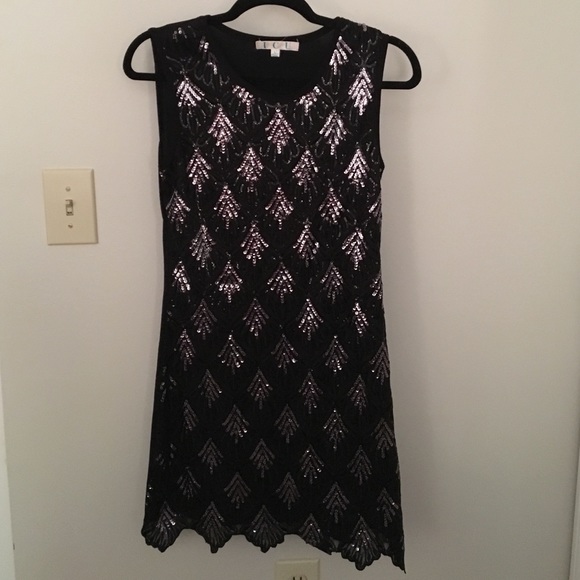 Black sequin dress, size L.