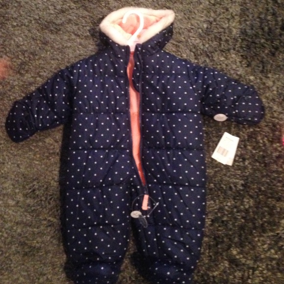Adorable lined winter one piece snowsuit for baby.
