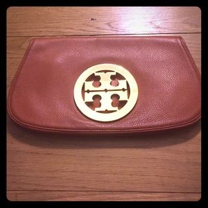 Small tan leather clutch