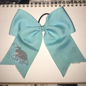 Light blue bow with a Santa hat