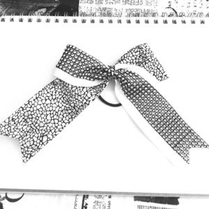Black and white cheerleading bow