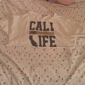 Cropped long sleeve Cali life shirt.