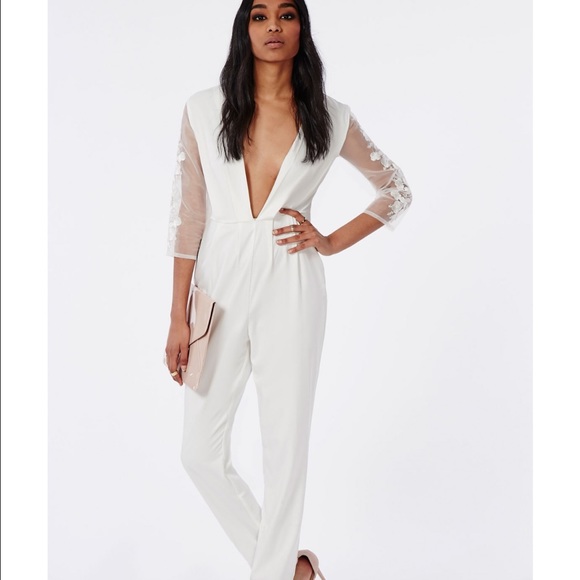 Missguided Pants - Missguided white jumpsuit NWT SZ 6