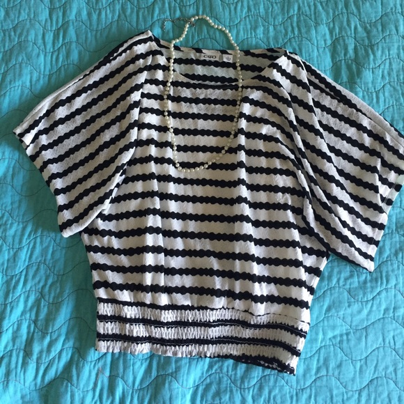 Back and white butterfly blouse.