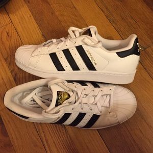 Adidas superstars black stripes