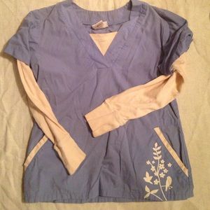 Blue and white long sleeved scrub top