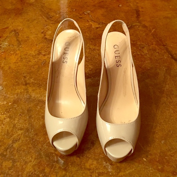 Guess open toe patent leather tan heels.