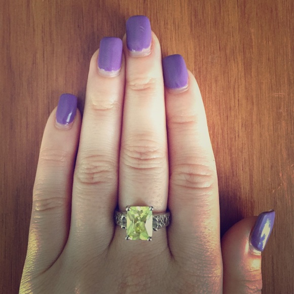Lia Sophia ring with bright green center stone