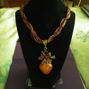 Beaded necklace.  2 av