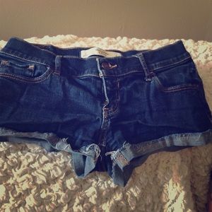 Abercrombie a and Fitch dark blue jean shorts.