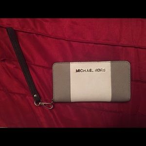 Michael Kors wristlet absolutely beautiful.