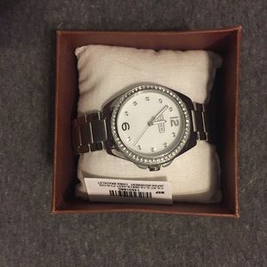 Silver coach watch with stones
