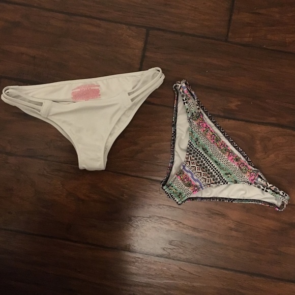 Two Victoria Secret swimsuit bottoms