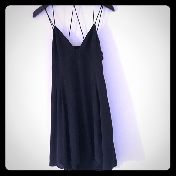 Strappy, low cut black dress