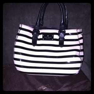 Kate Spade black and cream striped purse.