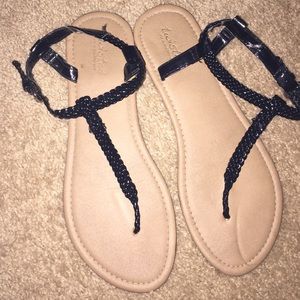 Black t-strap sandals