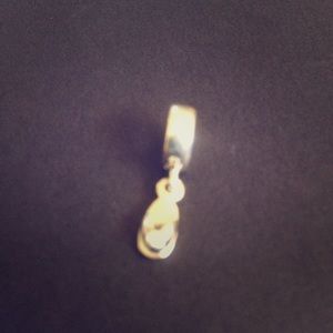 Flip flop with CZ retired Pandora charm.