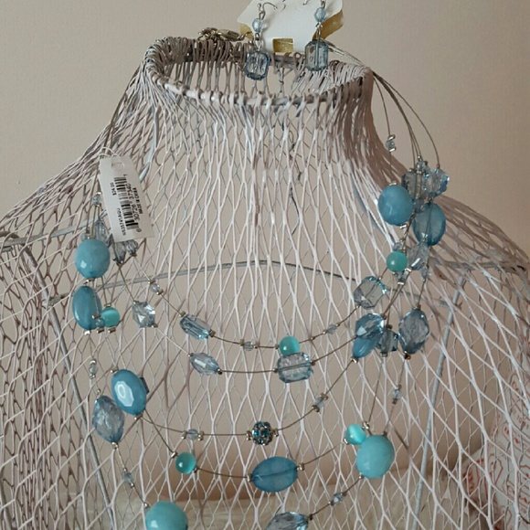 Necklace and arching earrings