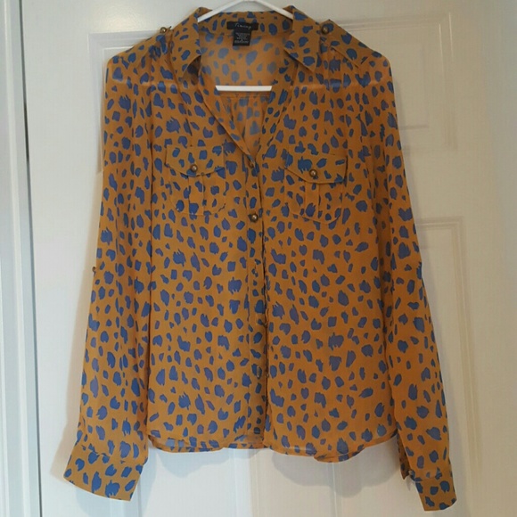 Leopard print orange and blue spotted blouse