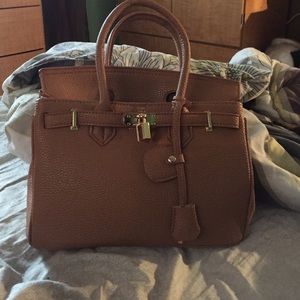 Brand new birkin inspired bag withorange dust bag