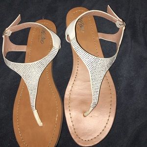 Silver and white sandals