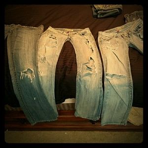3 pairs of shredded jeans