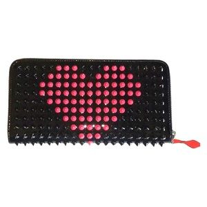 Louboutin Valentine black& fushia wallet. Studded