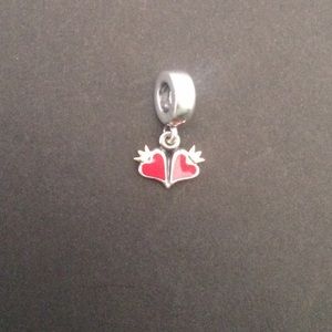 Pandora red enamel dangle heart charm.