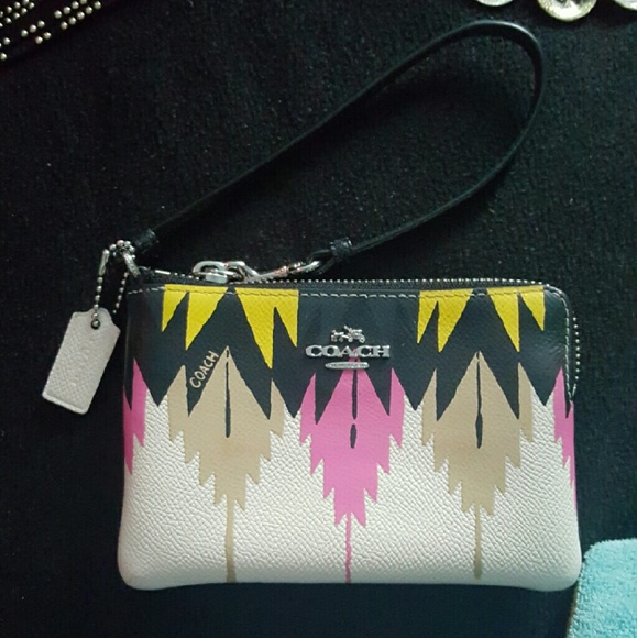 Coach leather hawk feather wristlet