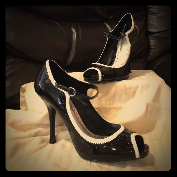 BCBGirls Peep Toe Spectator Pumps.