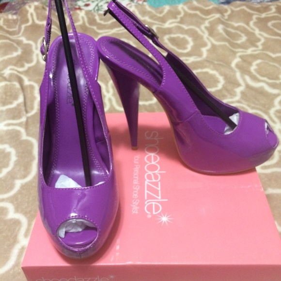 Shoe dazzle purple platform heels  in size 8.5