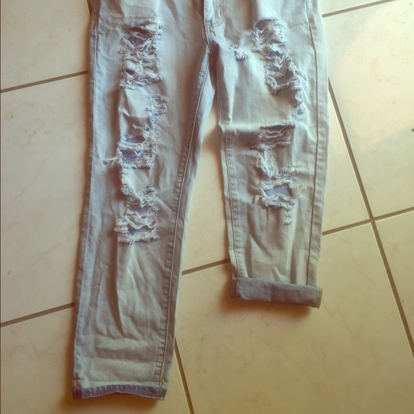 Light wash distressed boyfriend denim