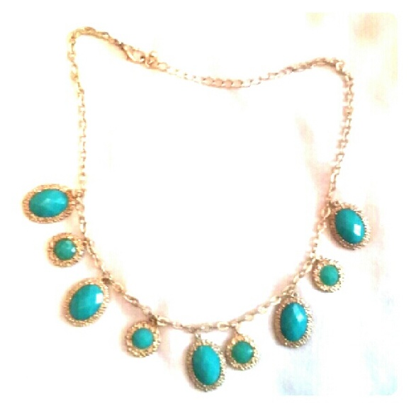Gold and teal statement necklace.